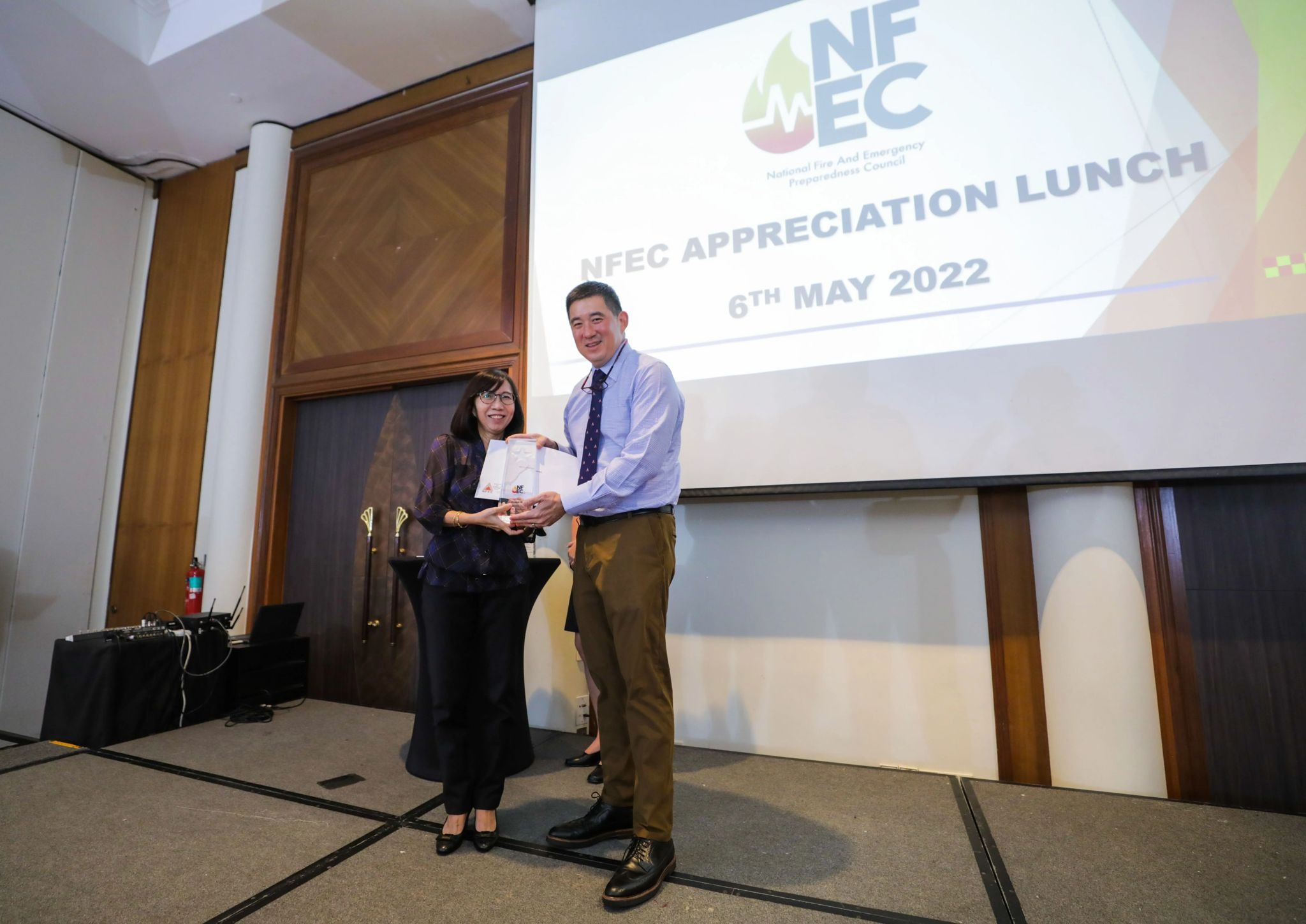 Presentation of Retirement Letter to Ms Margaret Heng for her 24 years of sterling service to NFEC